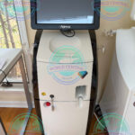 Alma Harmony XL Pro multi-application aesthetic laser treatment system with touchscreen interface.