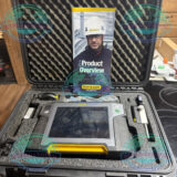Technician using Easy-Laser XT440 alignment tool on industrial motor and pump system
