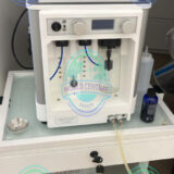 DiamondGlow facial handpiece and touchscreen interface