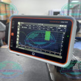 Technician using Krautkramer USM 100 for weld inspection