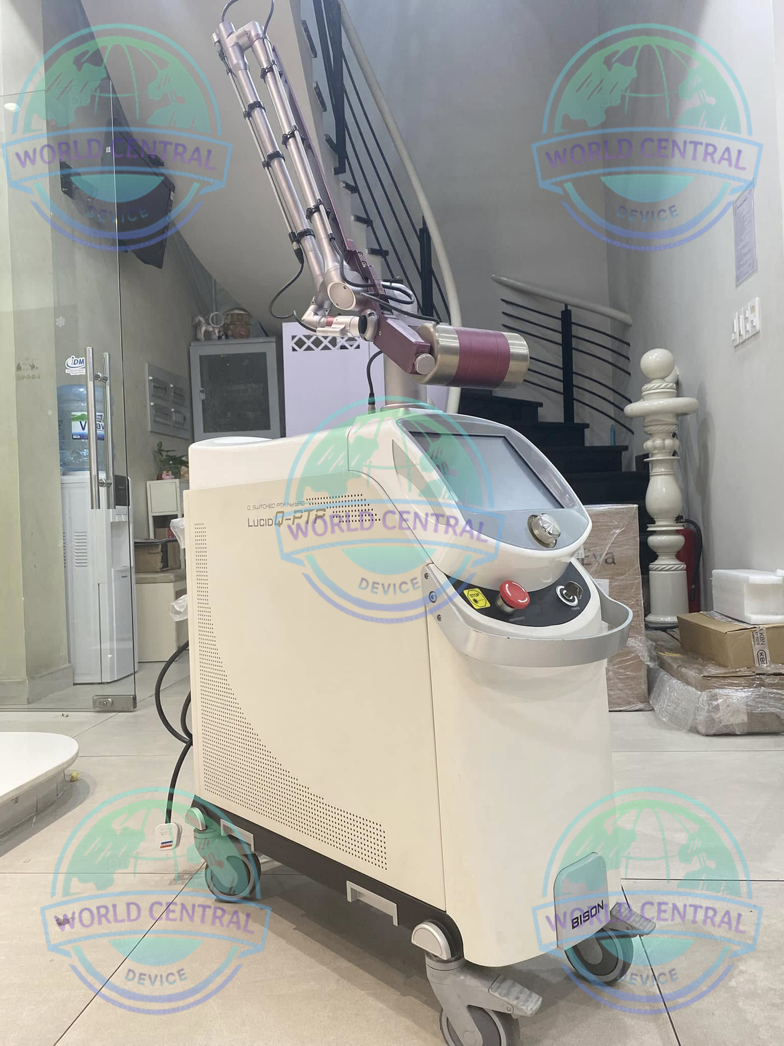 Bison Lucid Q-PTP Q-Switched Nd Laser System Bison Lucid Q-PTP Laser System with touchscreen interface and articulated laser arm for pigmentation and tattoo removal treatments.