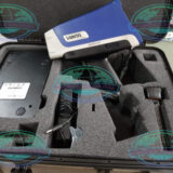 Technician performing positive material identification using Olympus Vanta C Series XRF analyzer