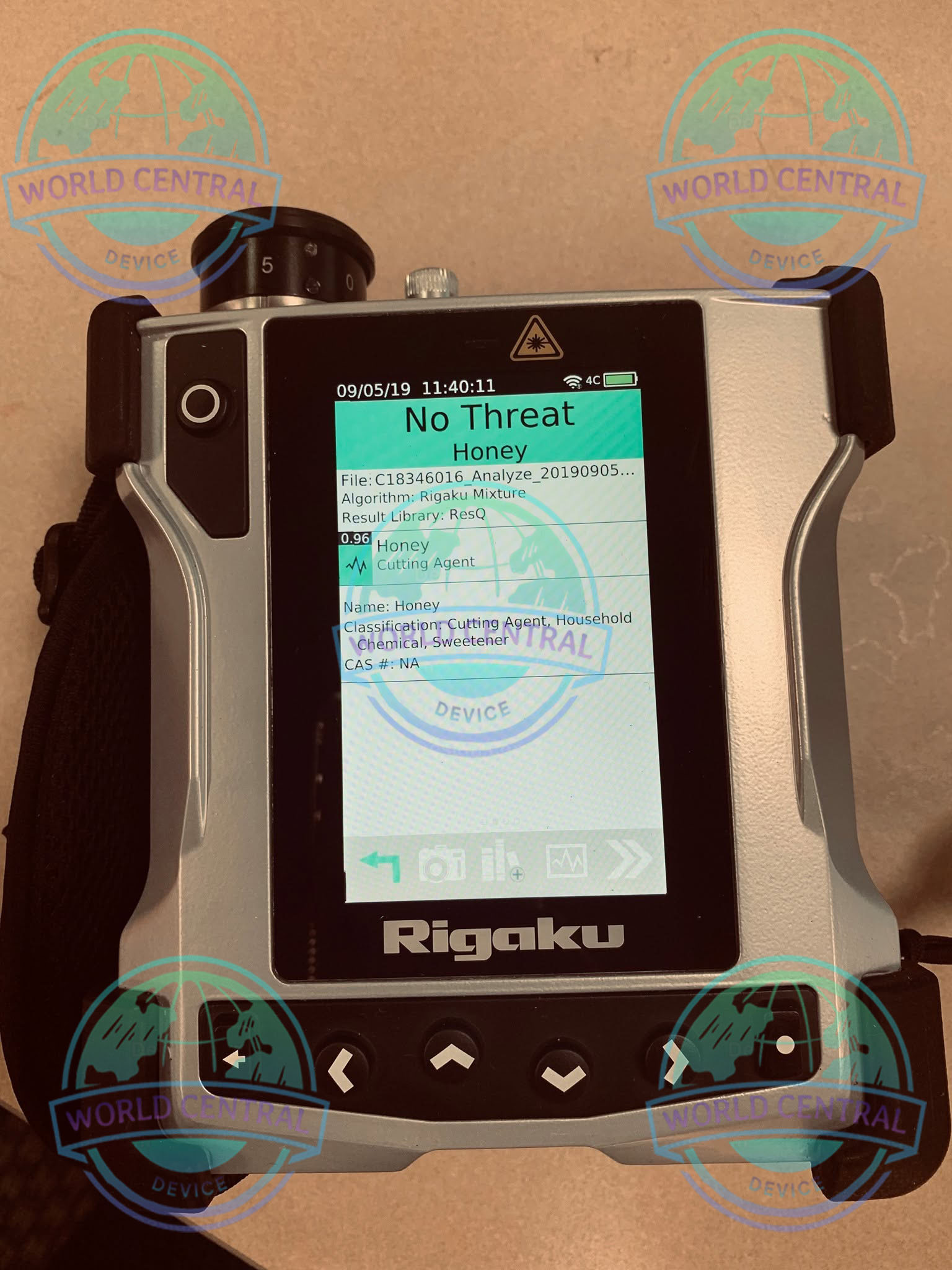 Through-Package Raman Chemical Identification Rigaku Progeny ResQ CQL performing Raman analysis through plastic packaging