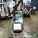 Lutronic Spectra XT performing professional facial laser treatment.