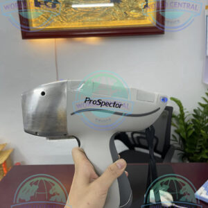Geologist using Elvatech ProSpector 2 portable XRF analyzer for mining exploration