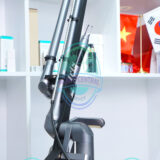 IRIS BlueCore laser delivering blue fiber optic beam during surgery