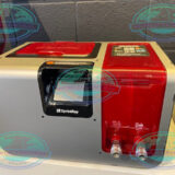 Dentist operating SprintRay Pro 95S dental resin 3D printer