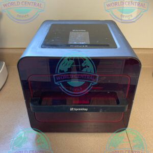 Dentist using SprintRay Pro 55S dental resin 3D printer in a modern clinic