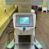 Patient receiving Lunula laser treatment